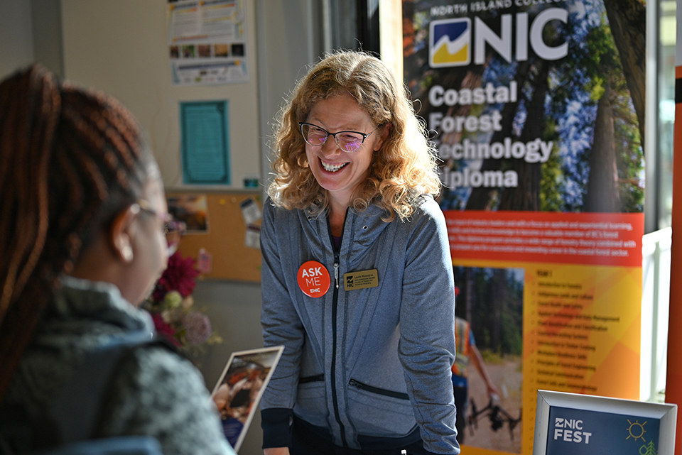 Staff member supporting a student