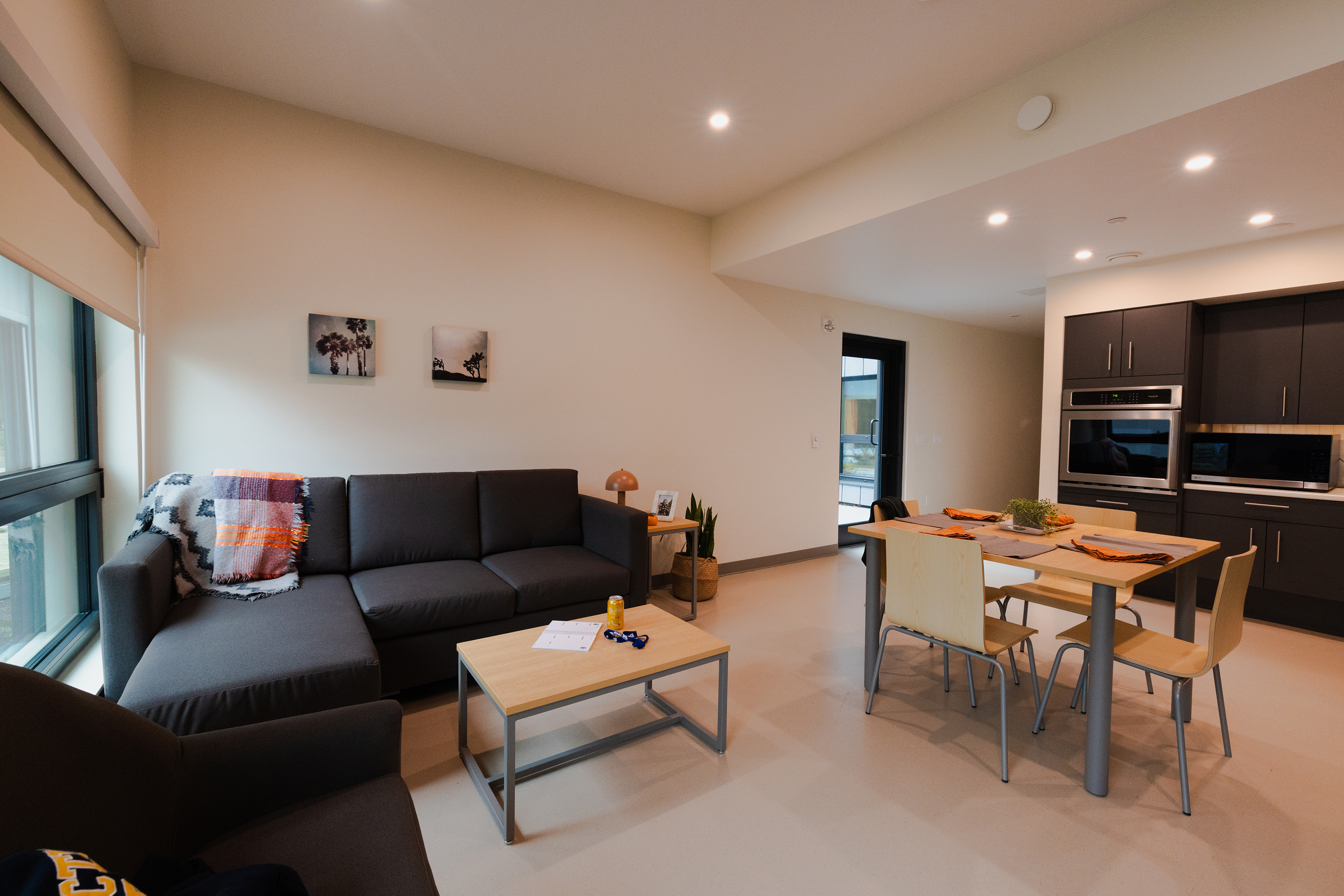 Interior photo of living and dining space in the shared double unit at tul'al'txw