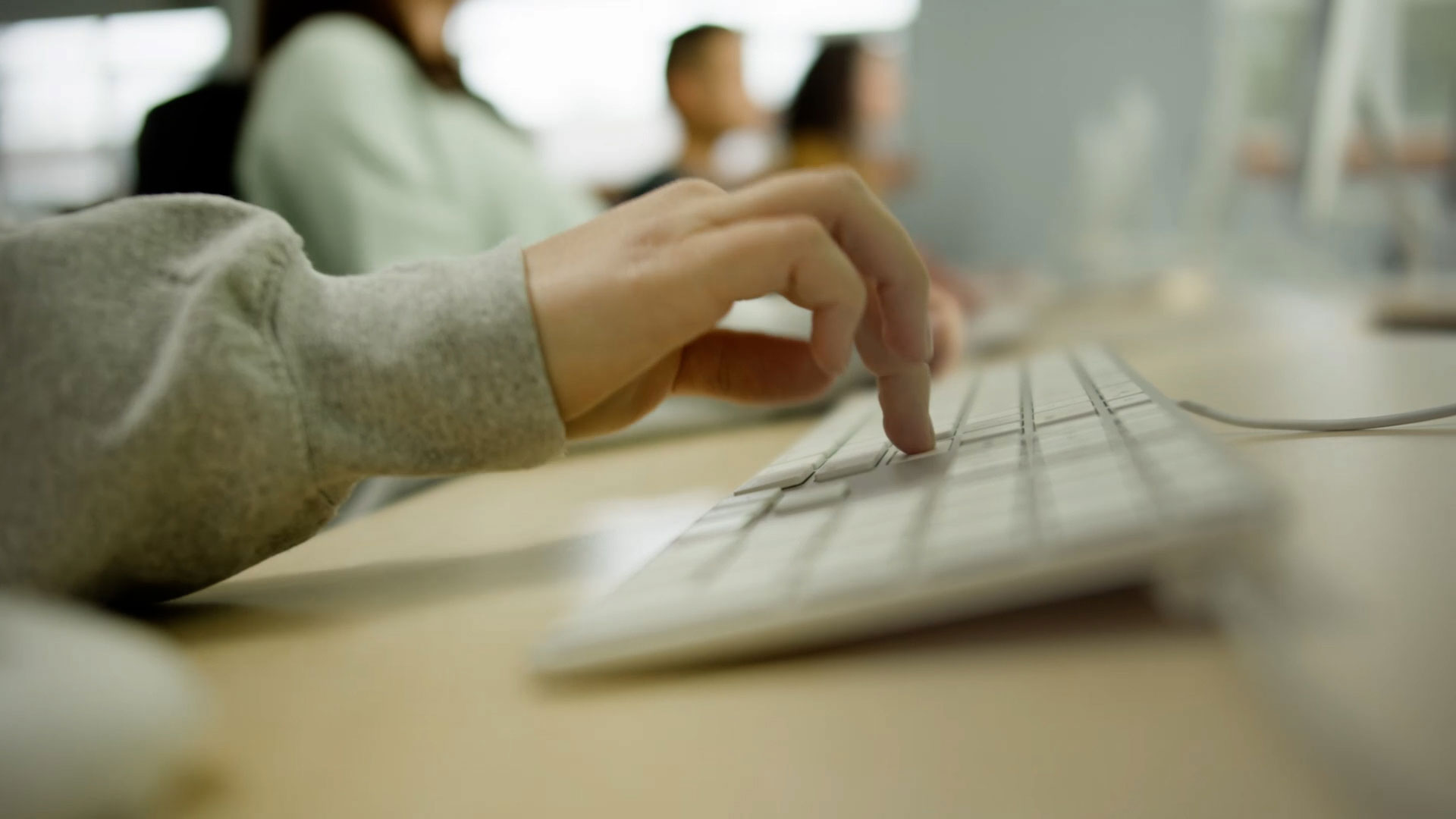 Student using apple keyboard