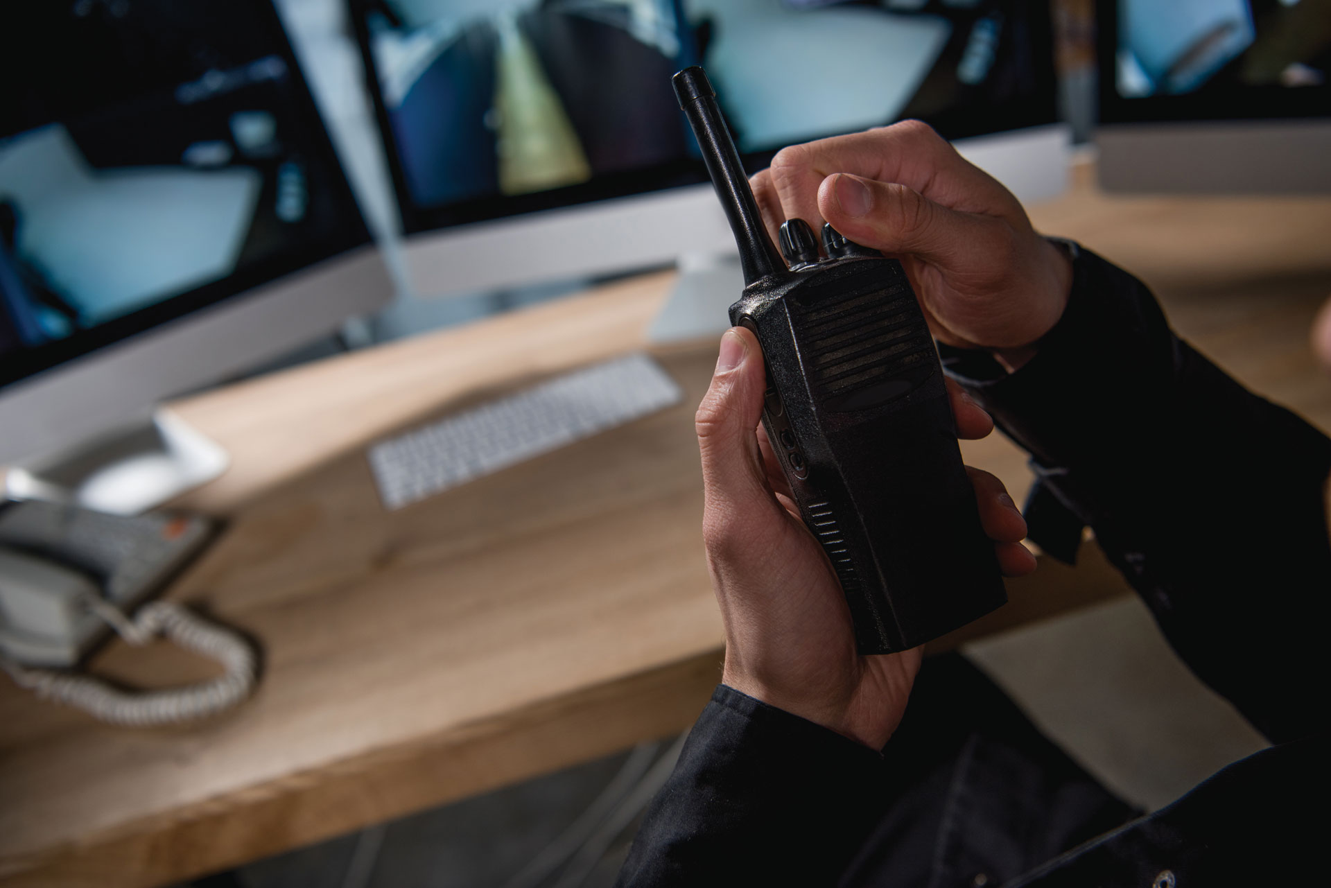 Worker operating a walkie talkie